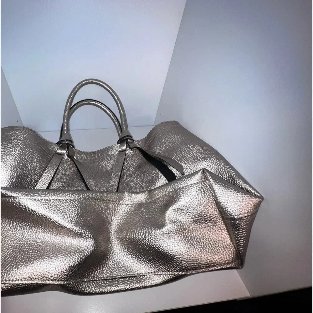 Victoria’s Secret, all gold pebble finish lined satchel w/ gold top zip closure‎